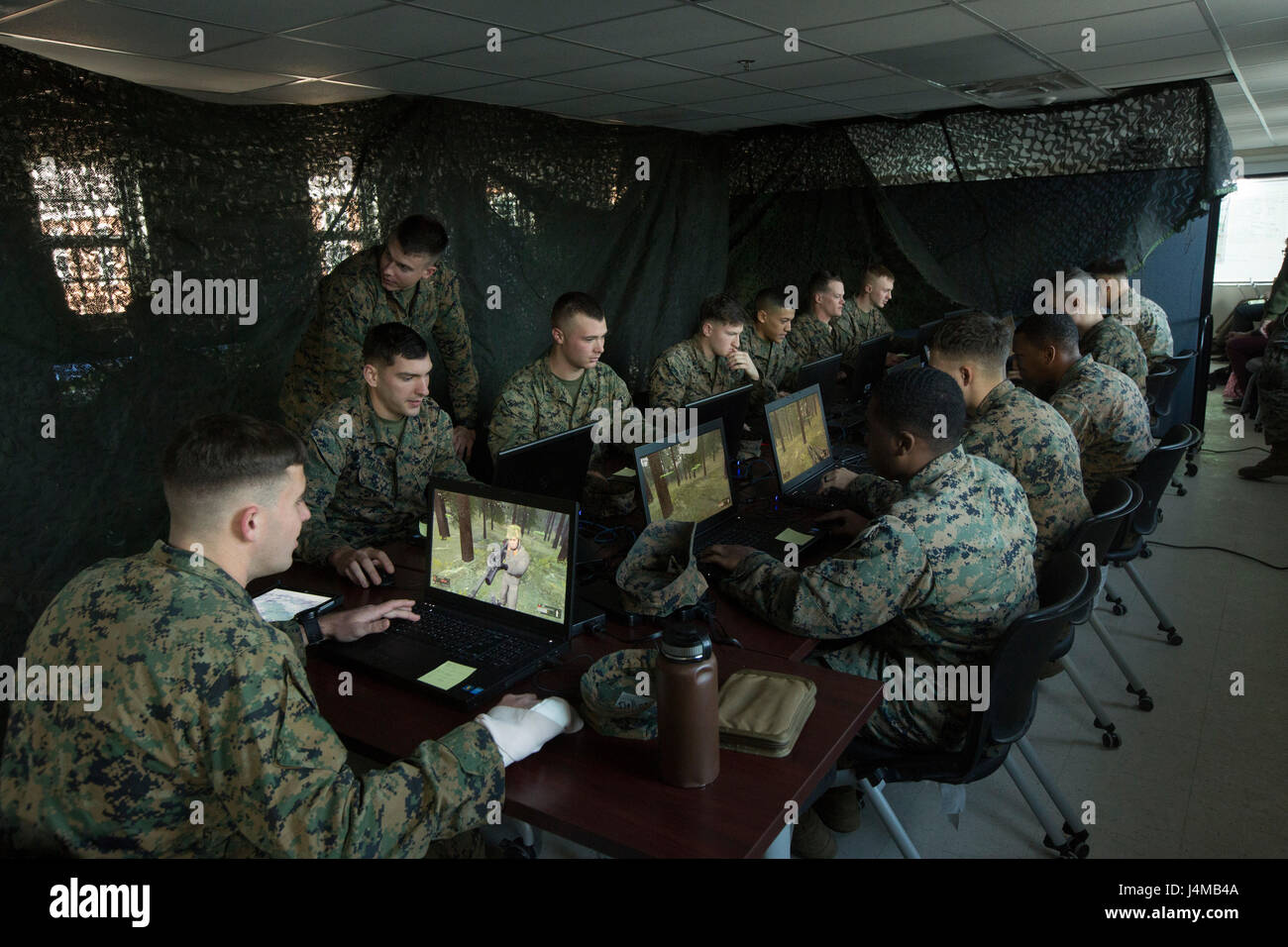 U.S. Marines with 2nd Battalion, 6th Marine Regiment, 2nd Marine Division (2d MARDIV), compete in the Spartan Tactical Games utilizing Virtual Battlespace 3 (VBS 3) on Camp Lejeune, N.C., Jan. 10, 2017. VBS 3 and the Spartan Tactical Games allow the Marines to test their tactical and cognitive thinking while competing against each other on a squad level. (U.S. Marine Corps photo by Lance Cpl. Tojyea Matally) Stock Photo