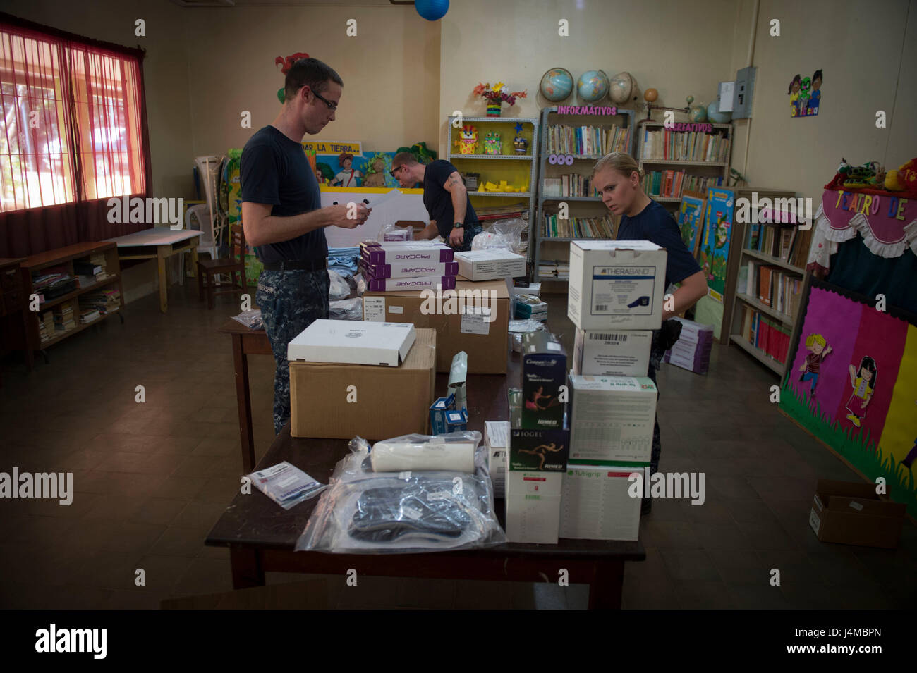 170220-N-YL073-057 TRUJILLO, Honduras (Feb. 20, 2017) – Sailors organize medical supplies at the Continuing Promise 2017 (CP-17) medical site in support of CP-17's visit to Trujillo, Honduras. CP-17 is a U.S. Southern Command-sponsored and U.S. Naval Forces Southern Command/U.S. 4th Fleet-conducted deployment to conduct civil-military operations including humanitarian assistance, training engagements, and medical, dental, and veterinary support in an effort to show U.S. support and commitment to Central and South America. (U.S. Navy photo by Mass Communication Specialist 2nd Class Shamira Puri Stock Photo