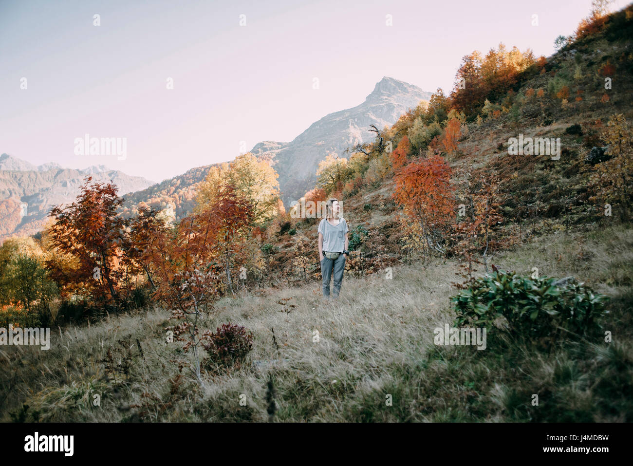 Caucasian woman hiking on mountain in autumn Stock Photo - Alamy