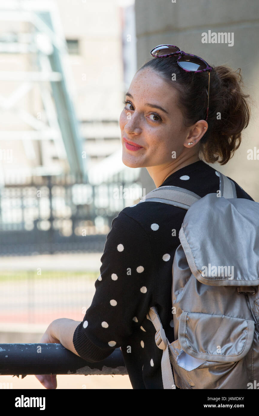 Portrait of smiling Caucasian teenage girl carrying backpack Stock ...