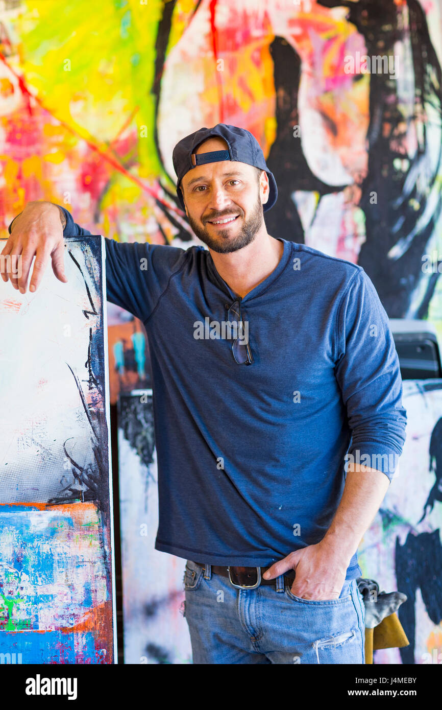 Painting of man in blue on canvas hi-res stock photography and images ...