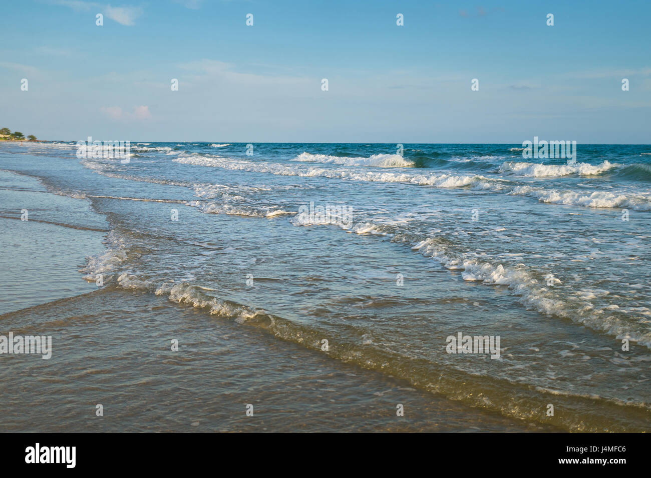 Tropical beach with clear water and blue sky Stock Photo - Alamy