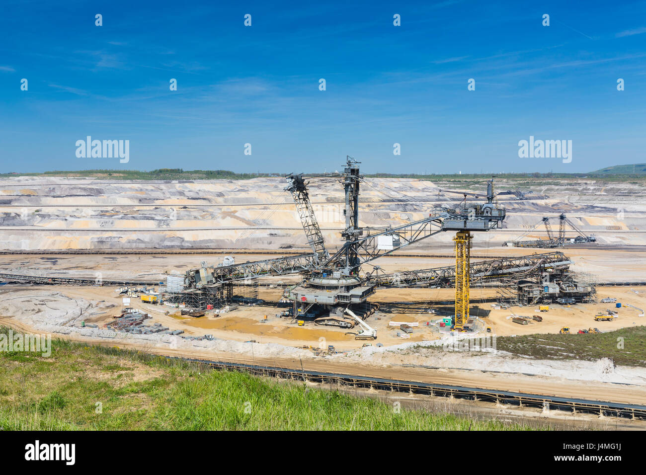 A giant Bucket Wheel Excavator under repair in a lignite pit mine Stock Photo