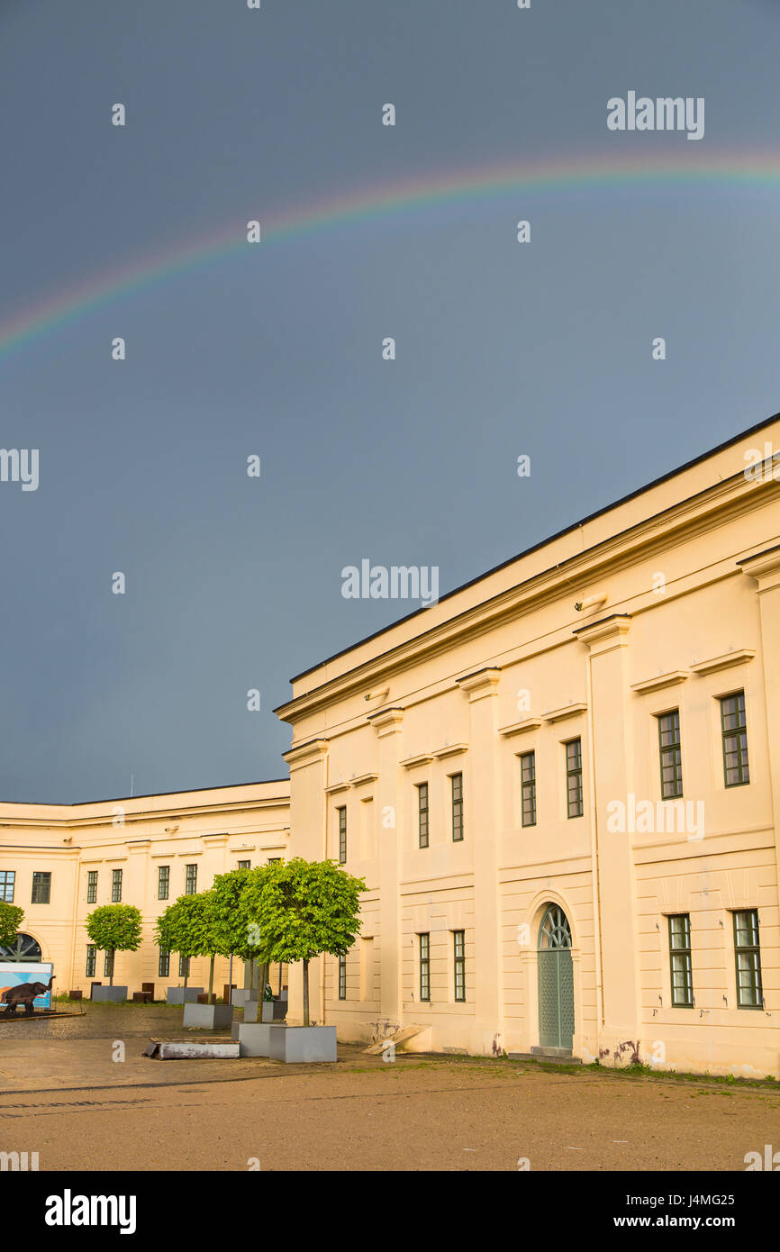 Ehrenbreitstein Fortress in Koblenz, Germany with a rainbow in the sky Stock Photo