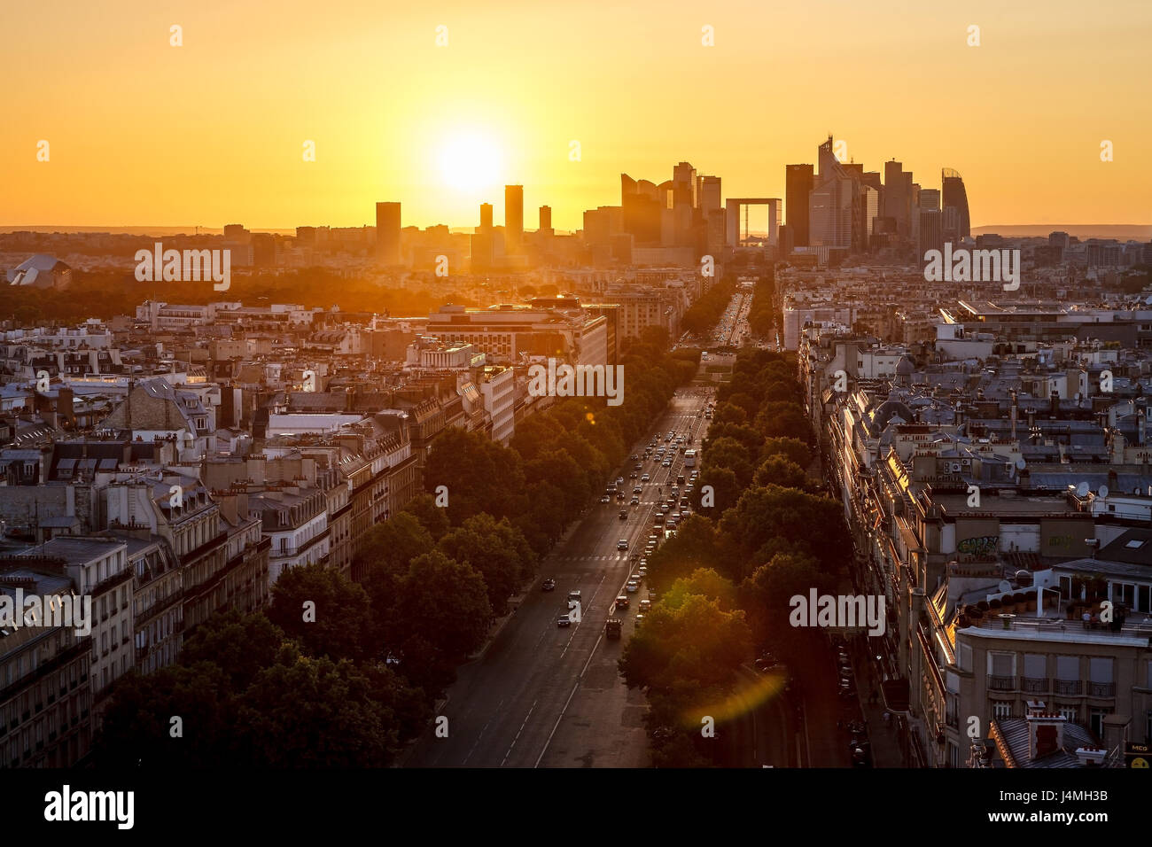 Avenue de la Grande Armee and La Defense neighborhood in Paris at sunset. France Stock Photo