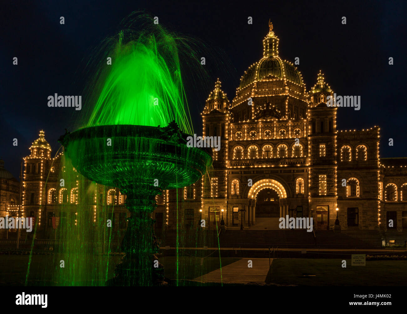 The fountain at the Parliament Buildings in Victoria, British Columbia, Canada, seen at night with illumination. Stock Photo