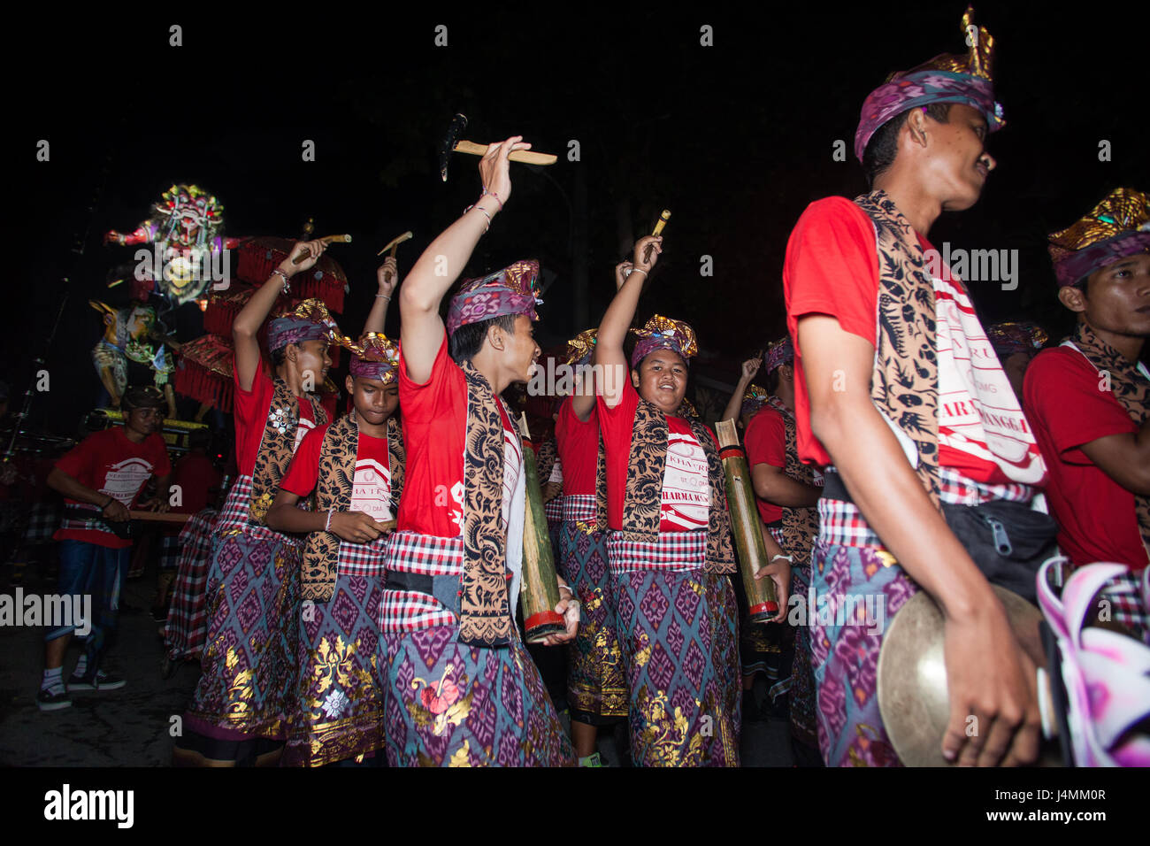 Street festival called the Ngrupuk Parade on the eve of the Balinese New Year with many people dressed in a variety of costumes parading to music Stock Photo