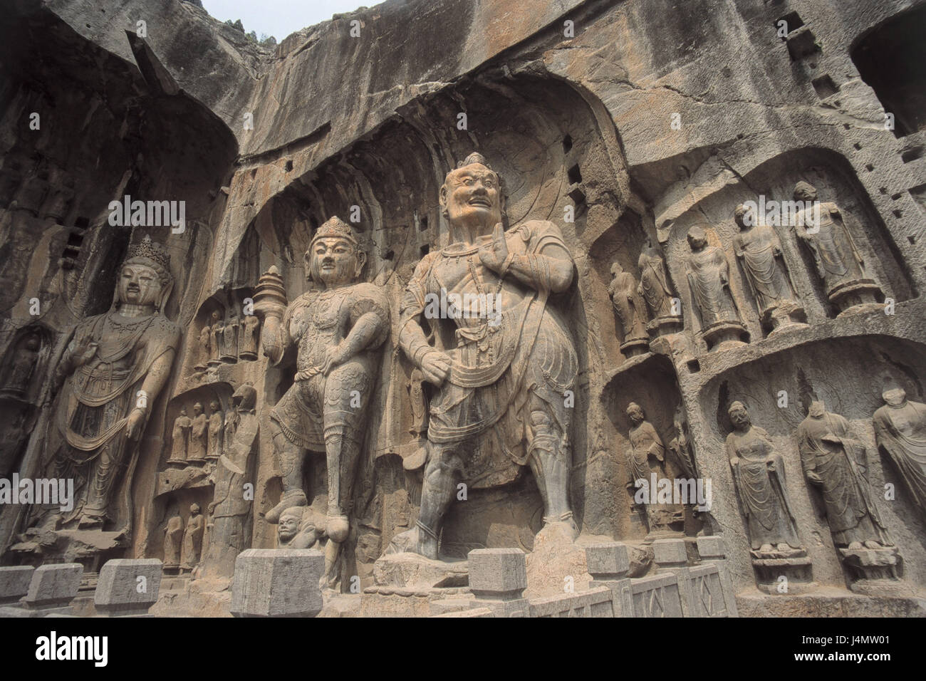 China, Henan Sheng, Luoyang, Longmen grottos, rock tombs, statues Asia, Eastern Asia, island state, Zhonghua Renmin Gongheguo, Lojang, Loyang, dragon's goal grottos, Longmengrotten, Longmen grottos, Hölentempel, cultural-historical structure, culture, architecture, sculpture, art, place of interest, daemons, awake characters Stock Photo