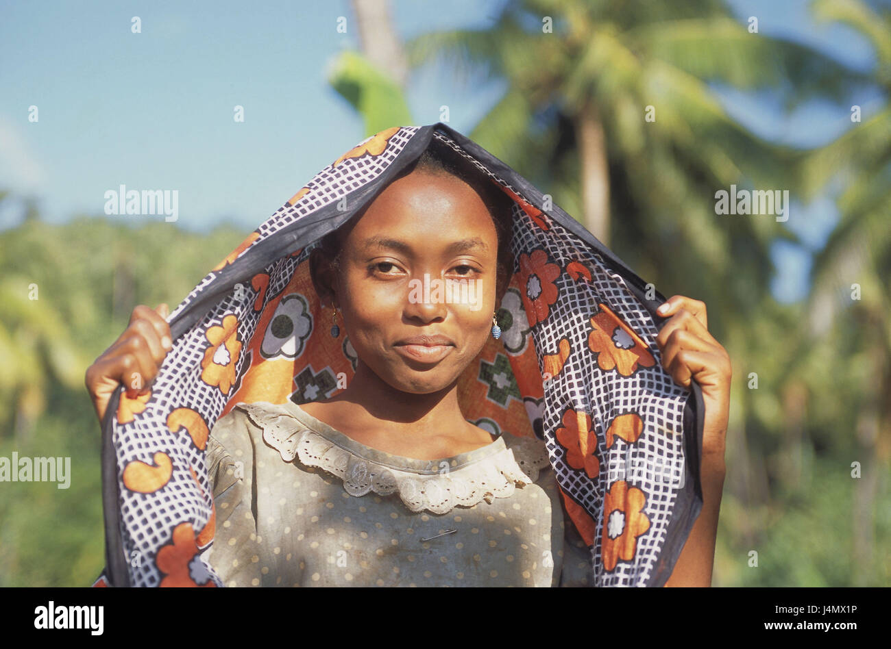 The Comoro Archipelago, island Anjouan, Moya, girl, smiles, headscarf, portrait, no model release! Africa, Indian ocean, island state, Nzwani, non-whites, young persons, swarthy, swarthy, locals, headgear, cloth, religiously, faith, view camera, shyly, uncertainly, outside Stock Photo
