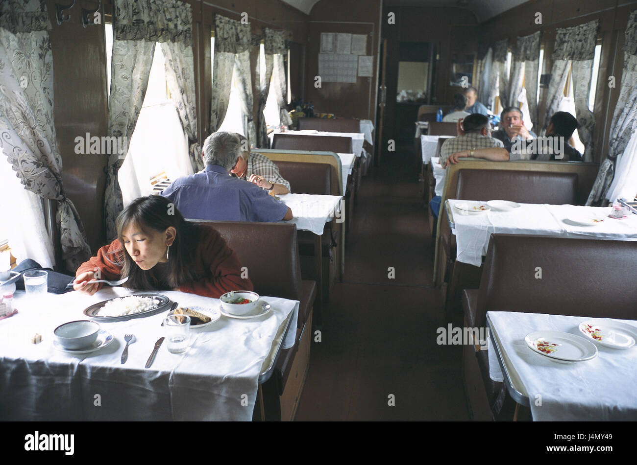 Russia, Siberia, trans-Siberian railway, dining car, passengers, no model release trans-Siberia express train, Russian express train, means of transportation publicly, train, trajectory, transportation of human beings, board restaurant, tourist, eat, drink, train journey, train driving, train journey, travelling, go away, section, railroad line, trajectory traffic, rail transport, experience, vacation, leisure time Stock Photo