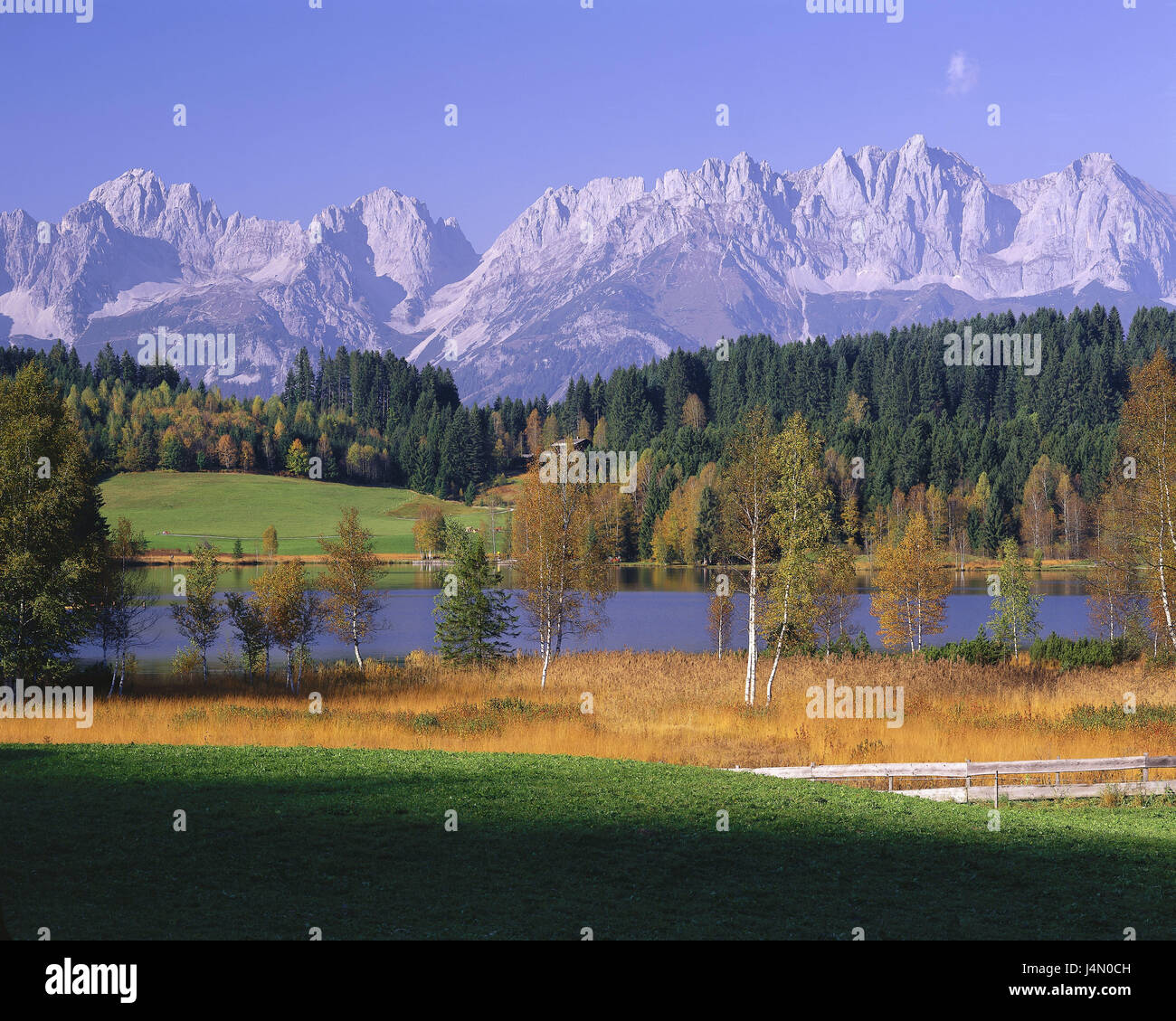 Austria, Tyrol, black lake, Wilder Kaiser, Ellmauer stop, Ackerlspitze, alps, mountains, mountains, Kaisergebirge, scenery, lake, water, view remote, deserted, trees, meadow, nature, season, autumn, Stock Photo