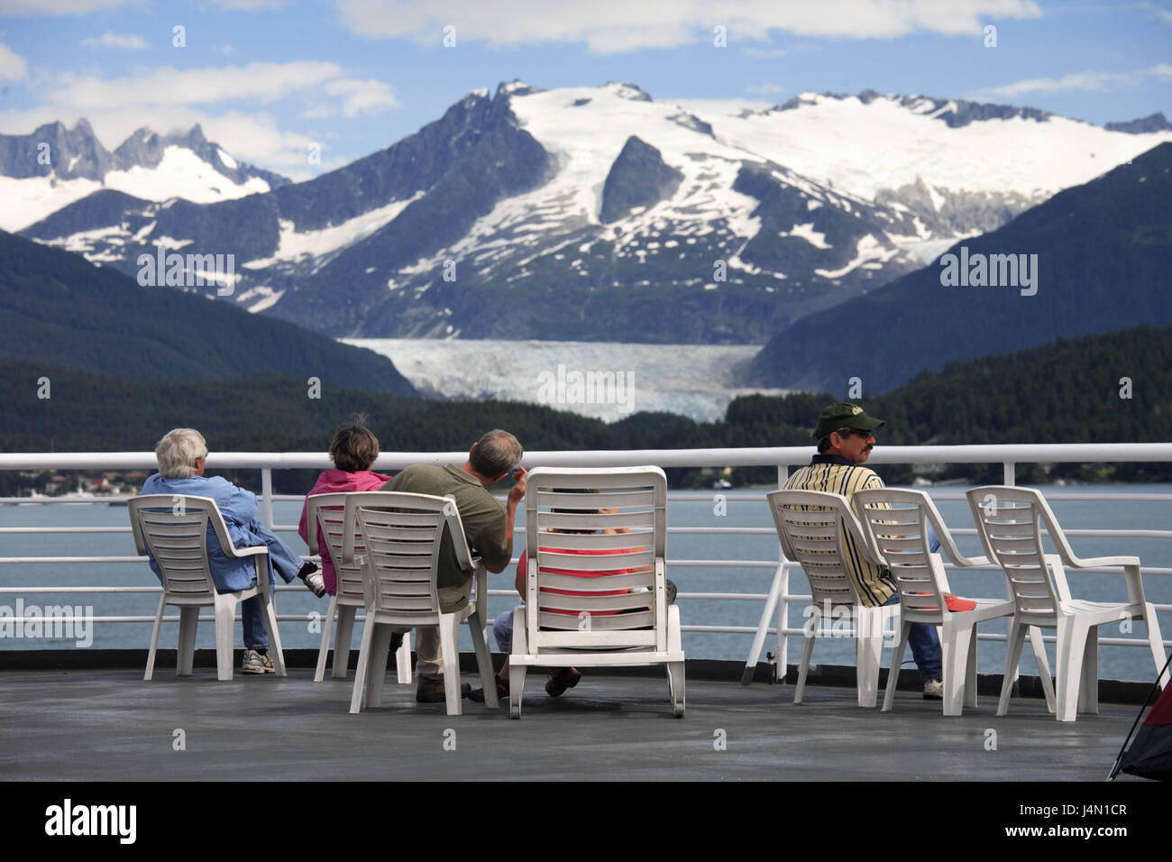 The USA, Alaska, ferry, deck, passengers, sit, back view, Mendenhall glacier, coast, sea, Stock Photo