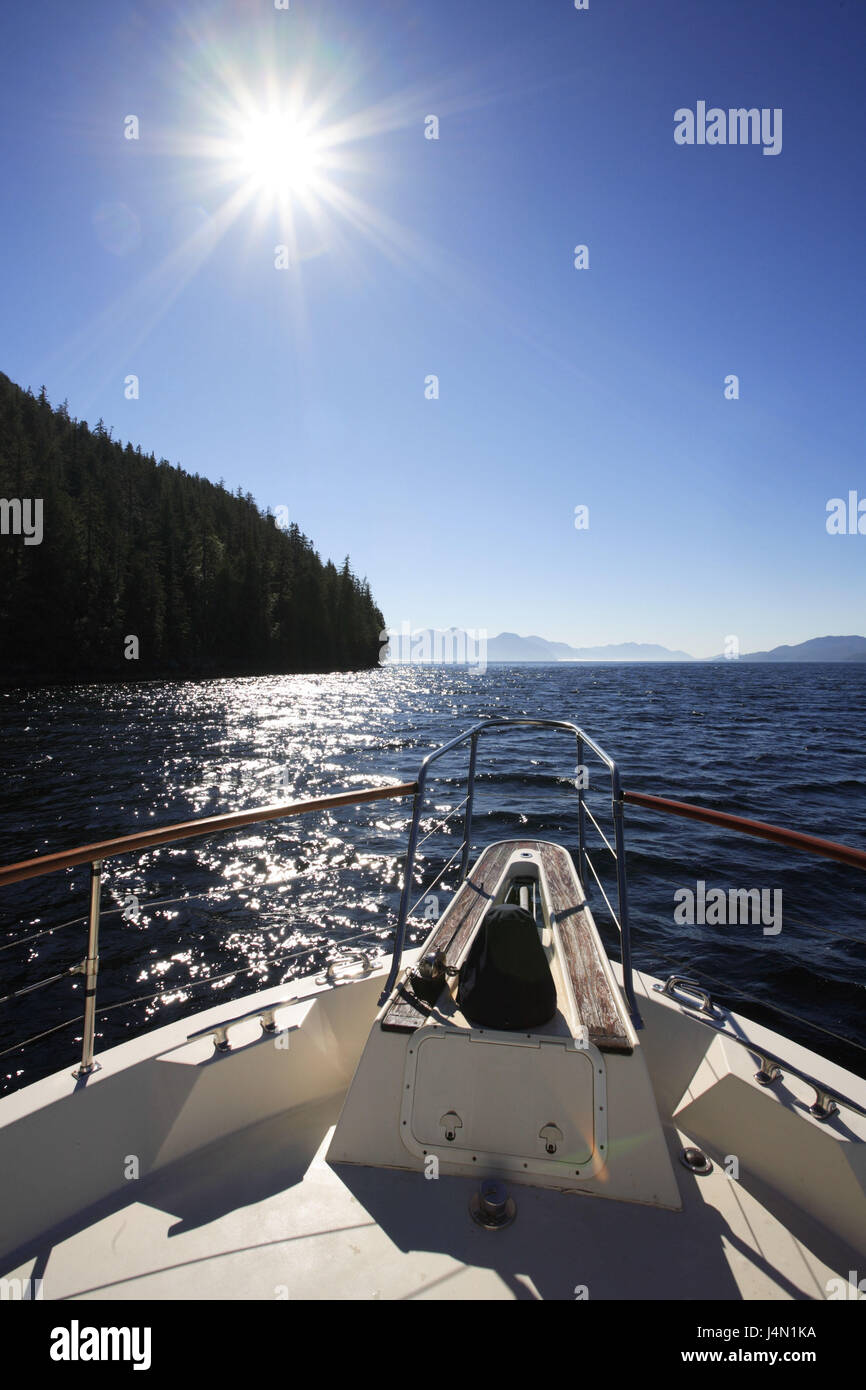 Canada, British Columbia, Great-Bear-Rainforest, fjord, boat, bug, view coast, sea, back light, Stock Photo