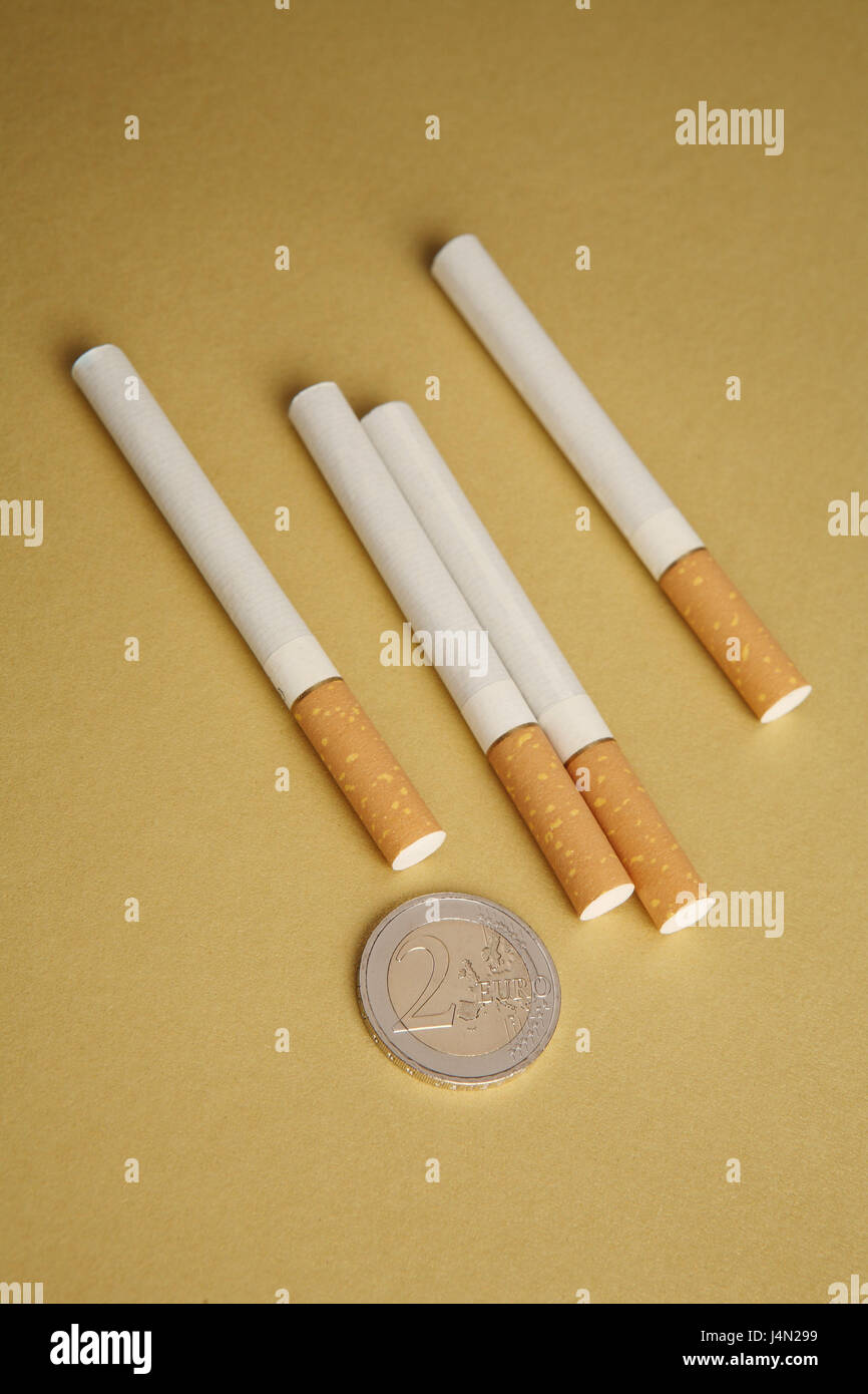 Cigarettes, money, euro-coin two, expensive, cigarette consumption, euro Stock Photo