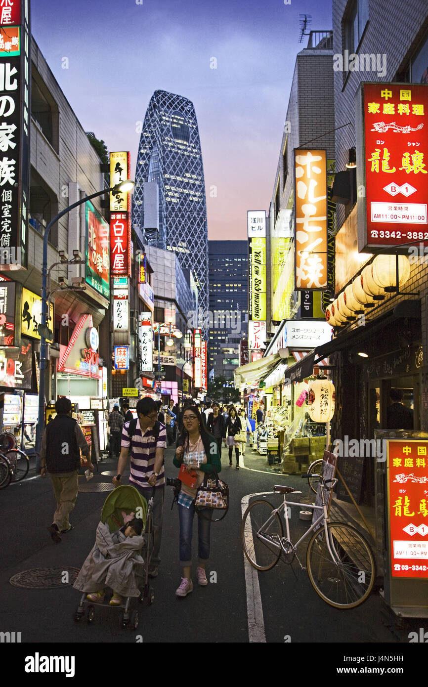 Japan, Tokyo, Shinjuku District Shinjuku, west Side, street gulch, person, dusk, Stock Photo