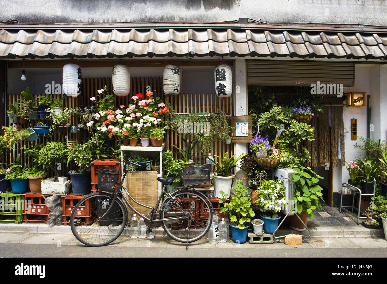 Japan, Tokyo, Shinjuku District, house facade, ornamental flowers, Stock Photo