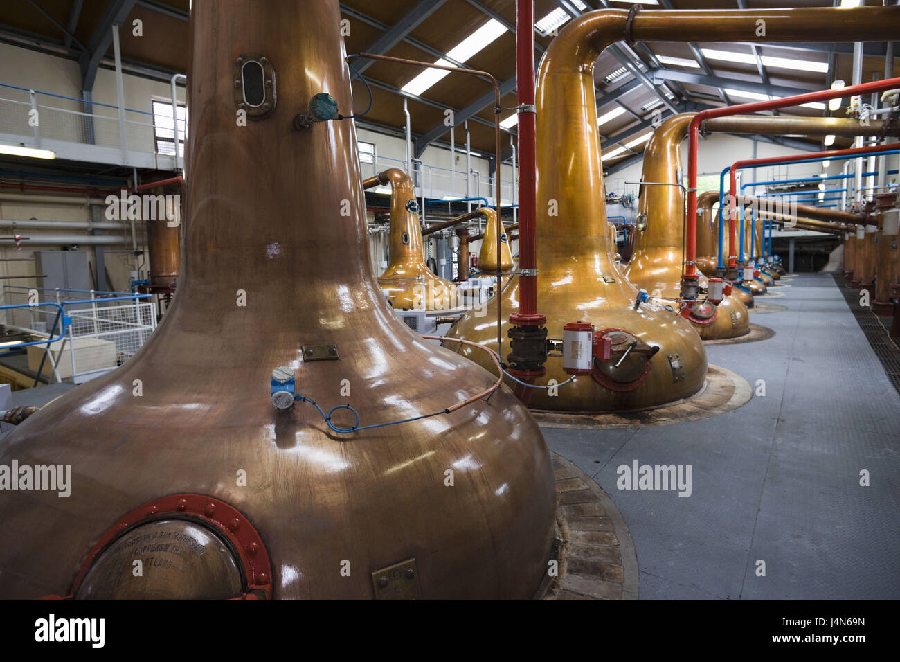 Great Britain, Scotland, Dufftown, Glenfiddich whisky Distillery, fuel hall, copper boiler, Stock Photo