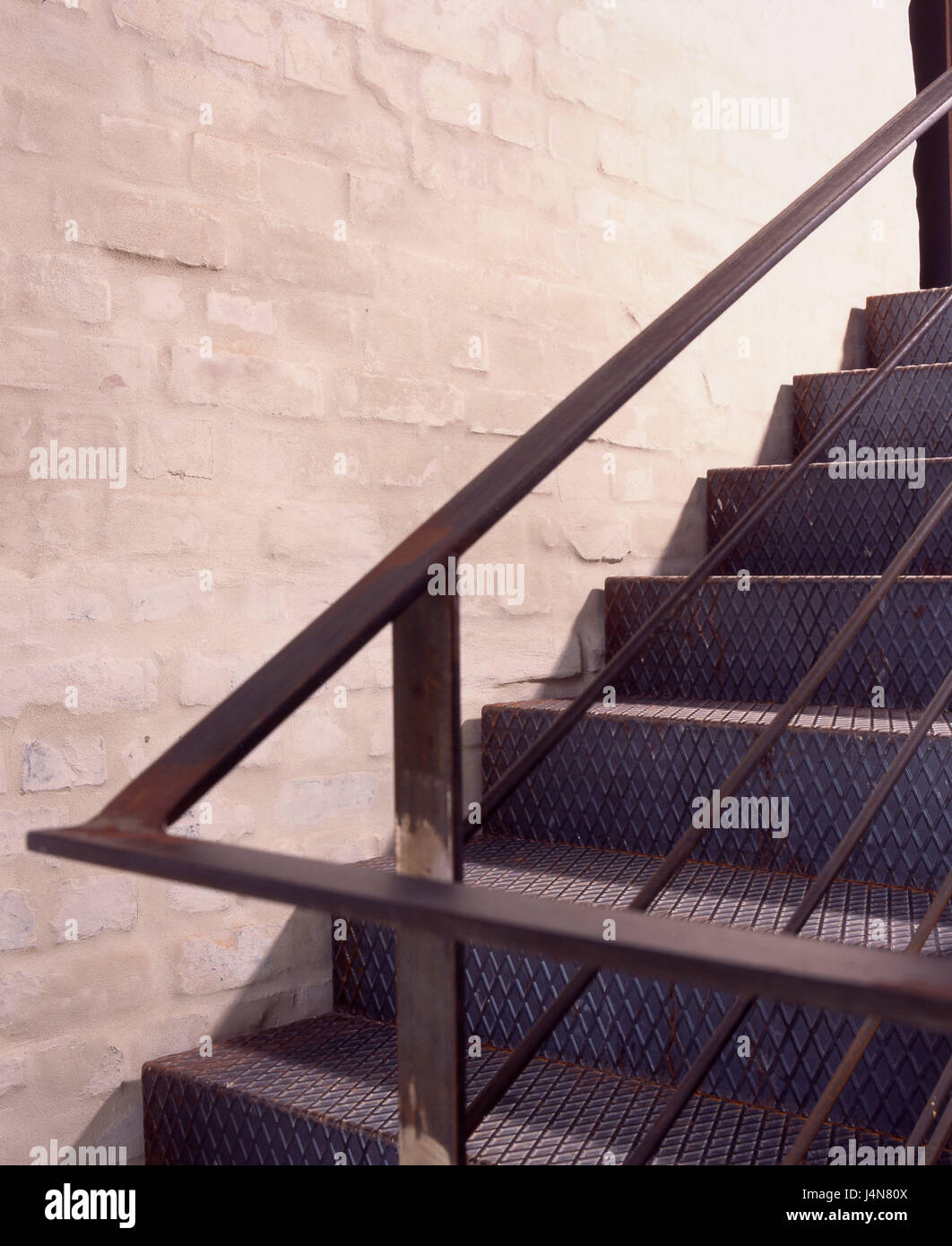 Interior shot, stairs rising, steel stairs, defensive wall, detail