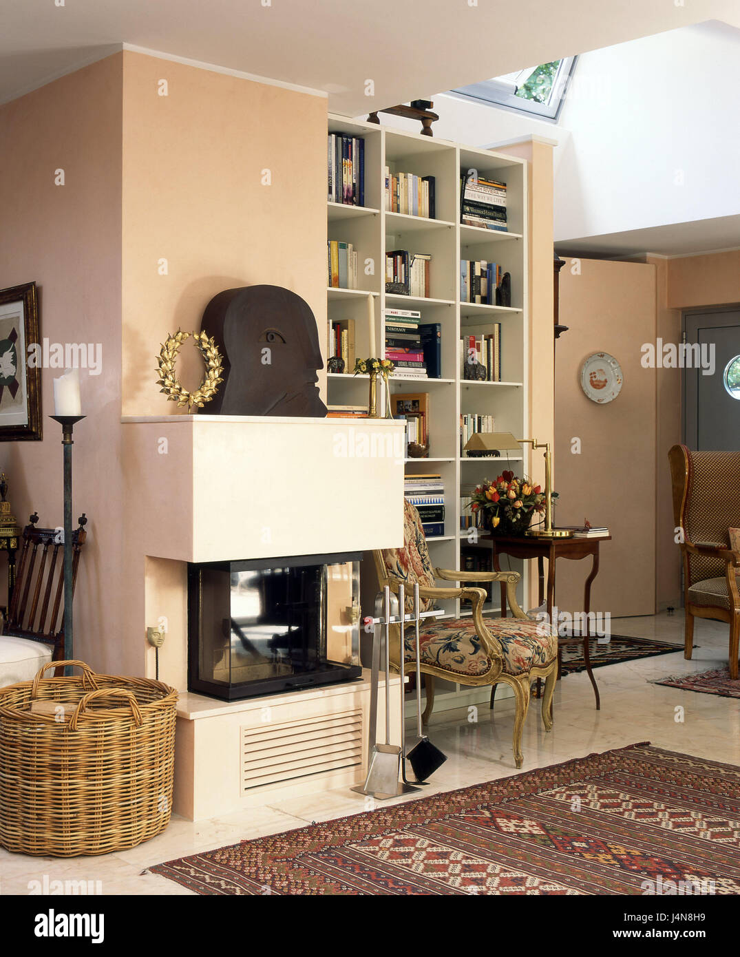 Living square, interior shot, chimney, period furnitures, flat, room, room, inside, living quarters, sitting room, kiln, chimney kiln, comfortably, comfortably, living, St. of furniture, shelf, bookshelf, armchair, wooden basket, detail, Stock Photo