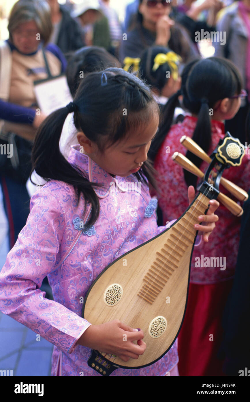 China, Hong Kong, Kowloon, girl, musical instrument, Asia, town, city, cosmopolitan city, metropolis, child, person, Asian, music, showing, performance, musical instrument, sounds, mandolin, stringed instrument, traditionally, in Chinese, Stock Photo