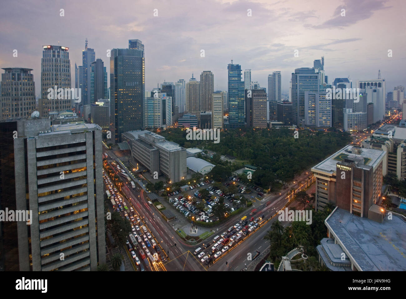 The Philippines, island Luzon, Manila, Makati District, high rises, lights, dusk, Asia, South-East Asia, town, capital, city, building, architecture, business premises, lighting, dusk, Stock Photo