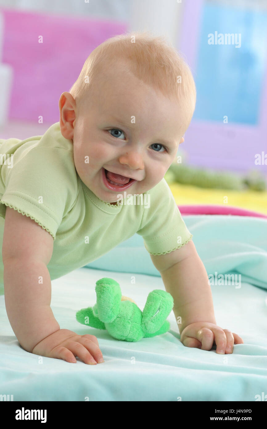 Baby, 8 months, creep, smile, substance toys, portrait, Stock Photo