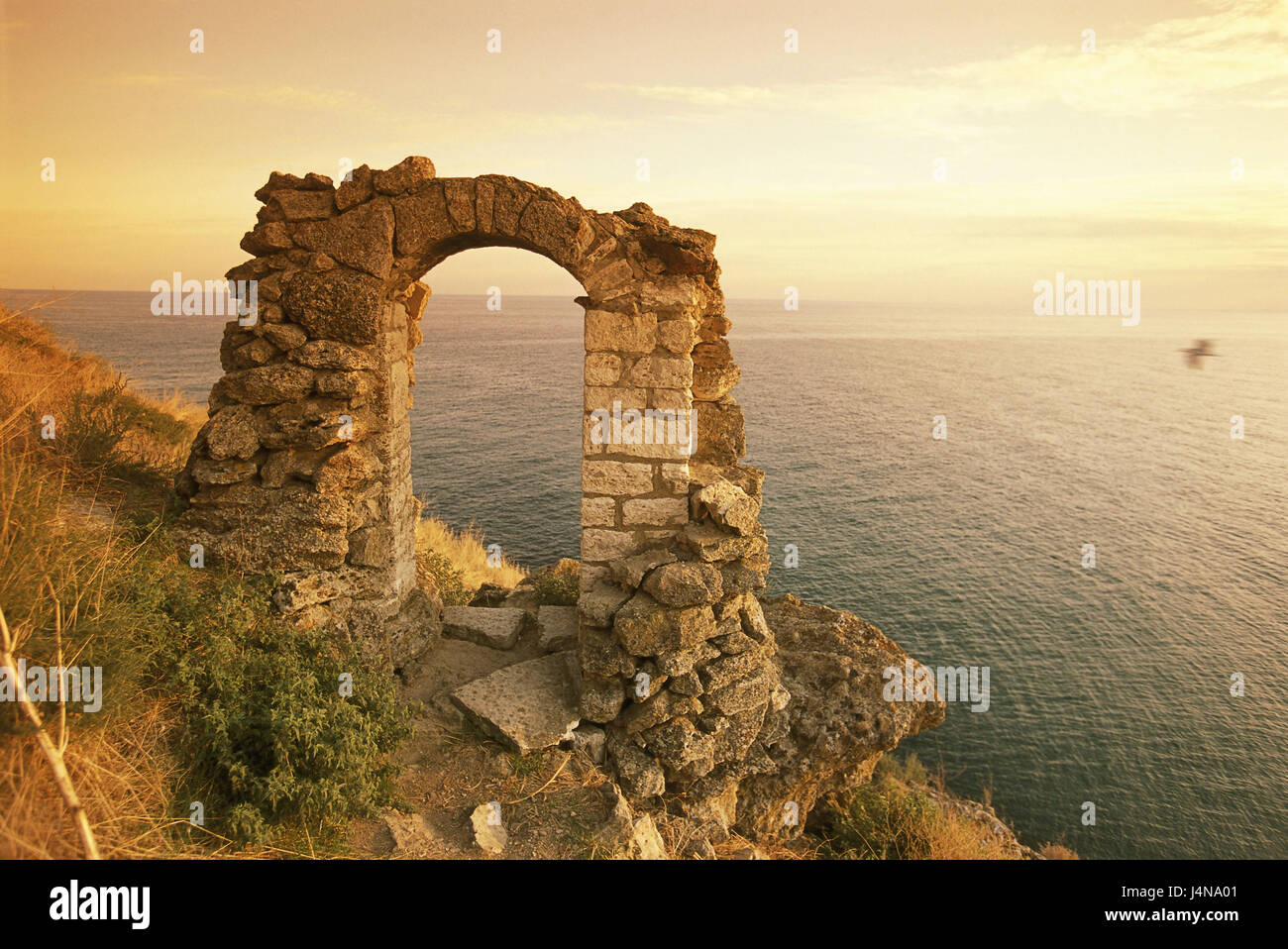 Bulgaria, cape Kaliakra, coast, ruin, archway, evening light, Black Sea coast, sea, cape, steep coast, ruins, gate, bow, stronghold, defensive wall leftovers, stone bows, width, horizon, lookout, place of interest, story, past, structure, remains, icon, expiration, transitoriness, tuning, evening, Stock Photo