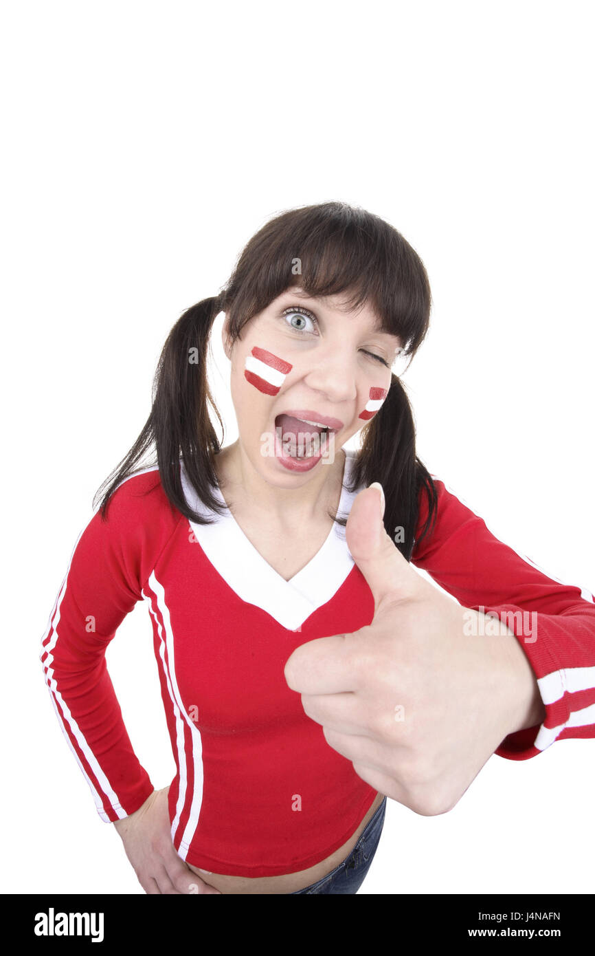 Woman, young, football fan, Austria, cheeks, greasepaint, national colours, wink, gesture, pollex, half portrait, European Football Championship, European championship, championship, person, brunette, painted, Austria, ball game, ball sport, enthusiasm, paints, emotion, euro, fan, flag, flag, national flag, national flag, football, football fan, football match, look, expression, facial painting, made up, conception, smile, national colours, nationality, Austrian, positively, red, white, fun, sport, tuning, studio, Frei's plate, wittily, transmission, perky, pertly, OK, Stock Photo