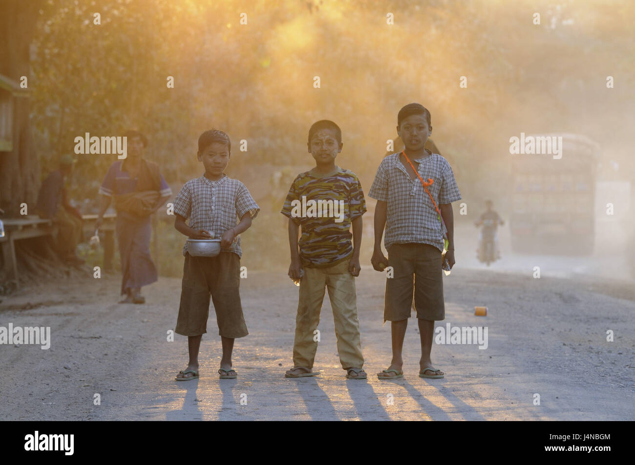 Children, street, stand, evening light, Myanmar, Stock Photo