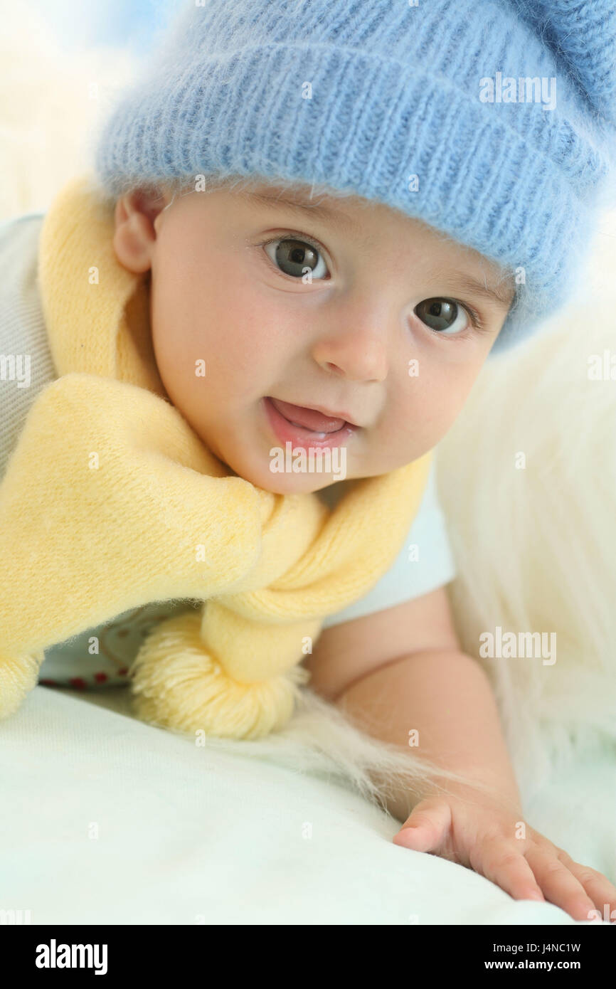 Baby, 5 months, cap, scarf, portrait, curled, Stock Photo