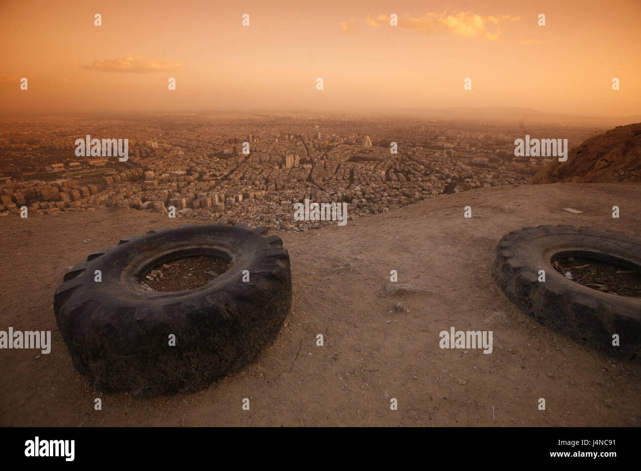 Syria, Damascus, town view, mountain Quassioun, tyre, evening light, Neustadt, city centre, overview, urbanity, close, city, view, garbage, waste, decontaminates, automobile tyres, afterglow, Weihrauchstrasse Stock Photo