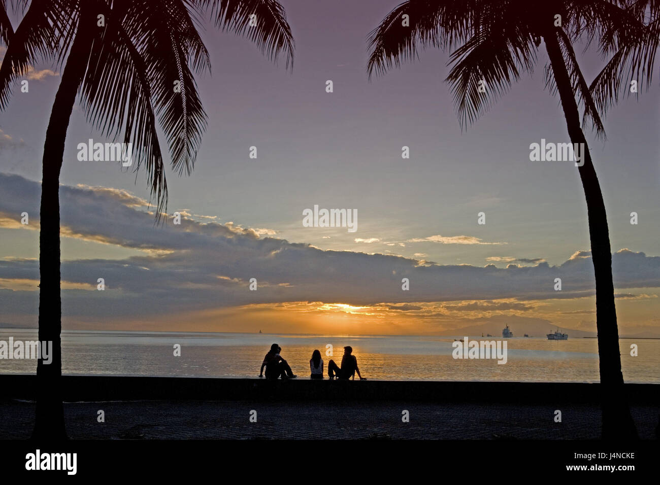 The Philippines, island Luzon, Manila, Manila Bay, palms, tourists, silhouette, sundown, destination, sea, sea view, view, palm beach, fantastically, dream vacation, beach vacation, afterglow, atmospheric, people, vacationers, romanticism, Stock Photo