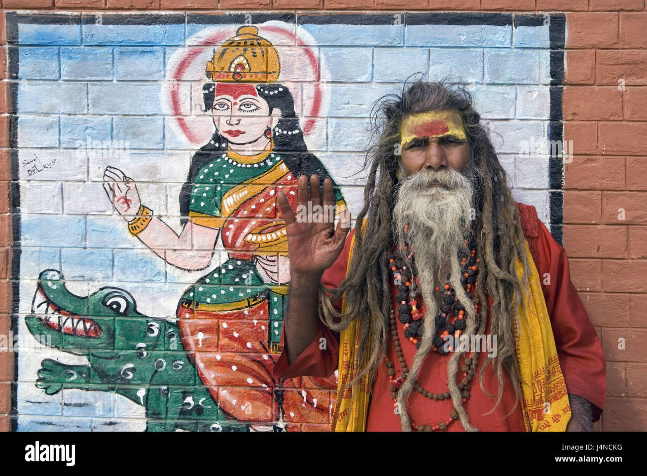 India, Uttar Pradesh, Benares, defensive wall, painting, Sadhu, gesture, portrait, Stock Photo