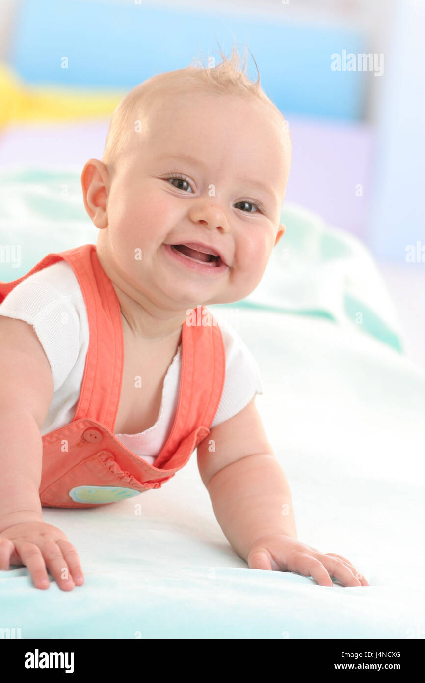 Baby, 6 months, lie, smile, portrait, Stock Photo