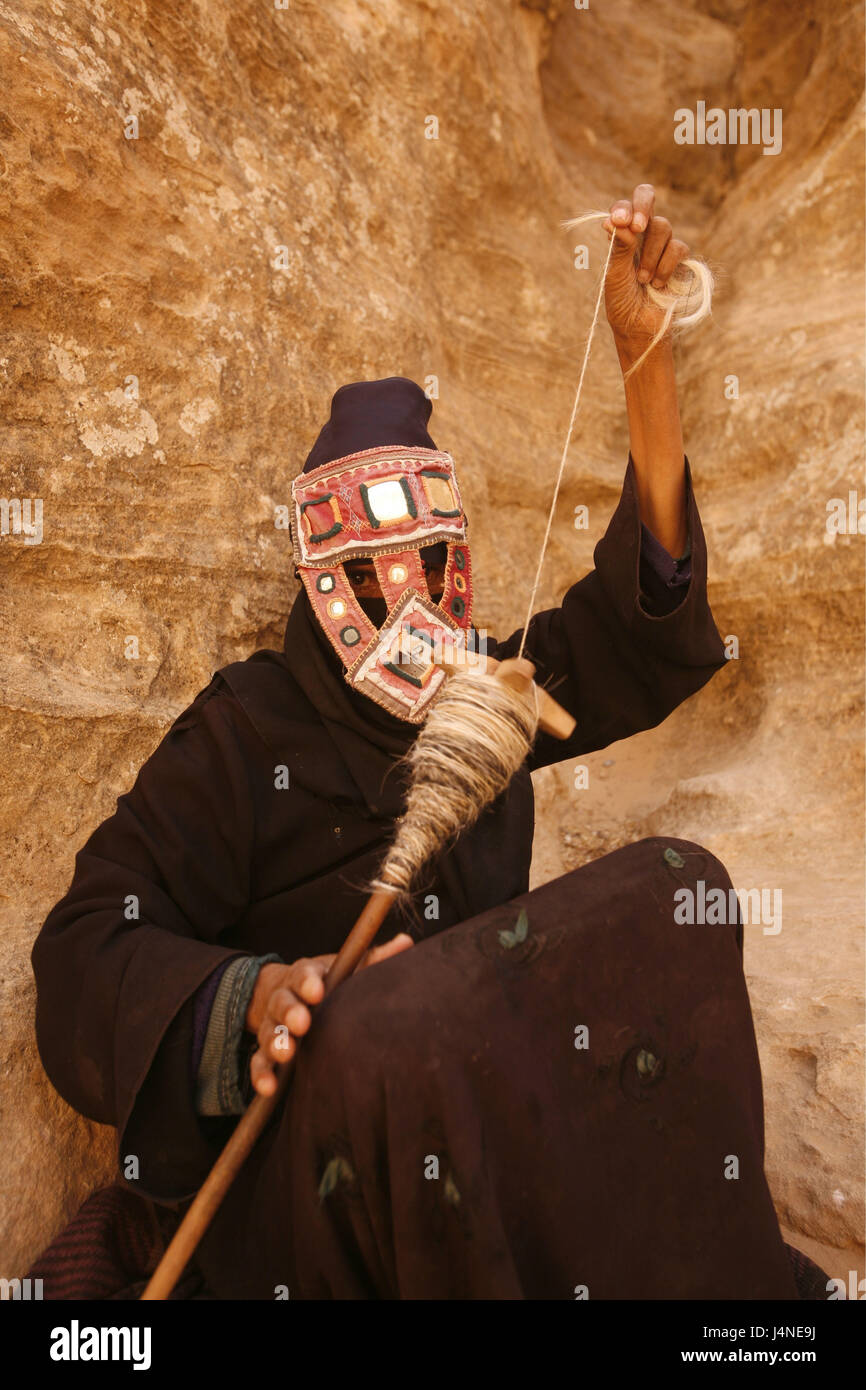 The Middle East, Jordan, Petra, woman, clothes, facial veil, traditionally, wool spin, Stock Photo