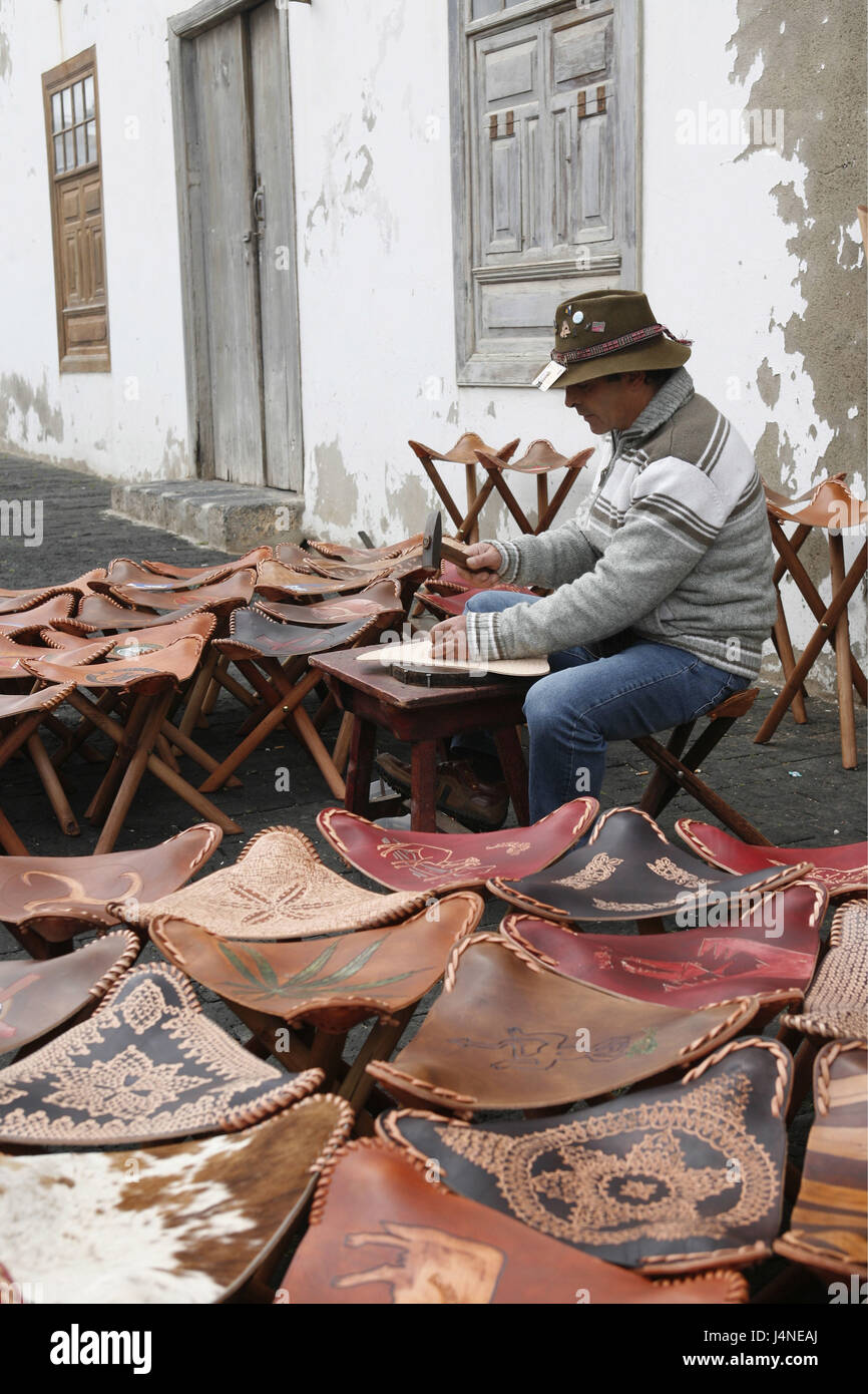 Spain, Lanzarote, Teguise, Old Town, Sunday market, worker, stool, make, Stock Photo