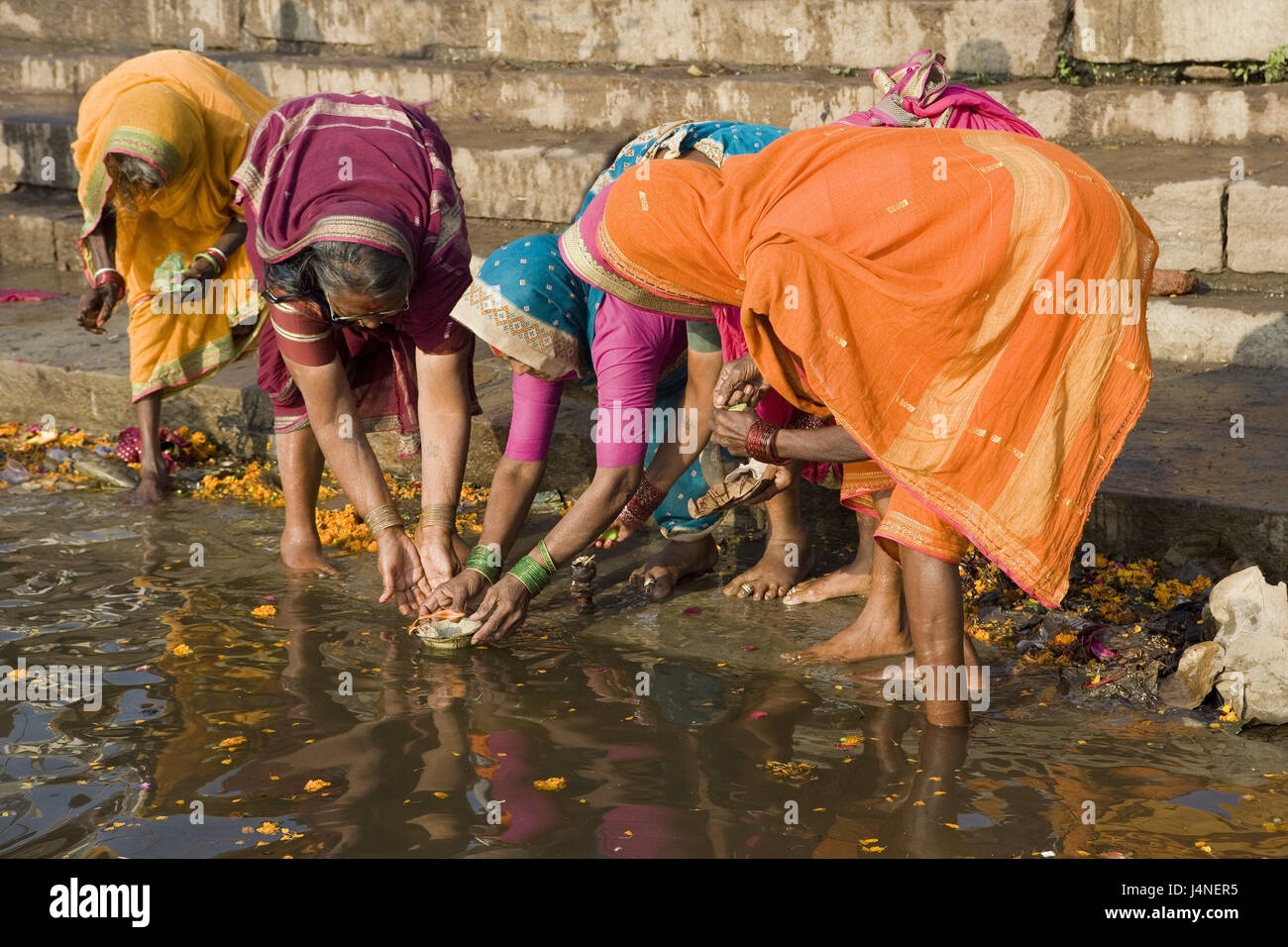 India, Uttar Pradesh, Benares, walk, Dasaswamedh Ghat, women, offering, Stock Photo