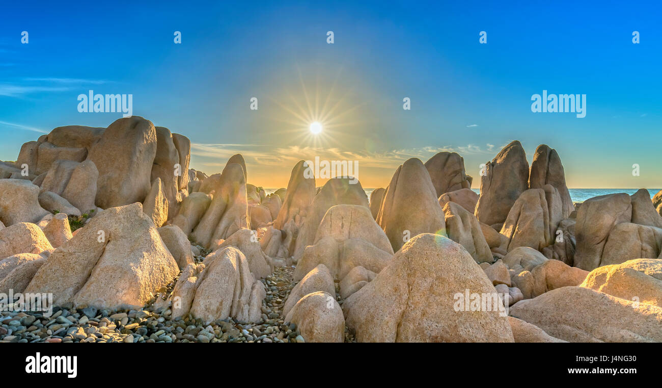 Stones covered with sunstars welcomes dawn  beautiful new day Stock Photo