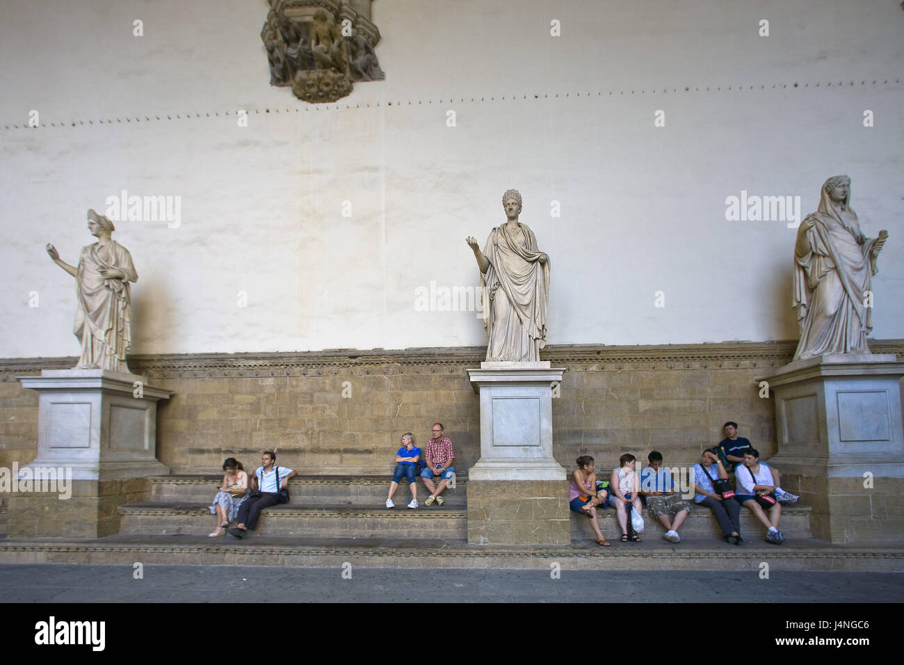 Italy, Tuscany, Florence, Piazza della Signoria, statues, steps, tourists, sit, Stock Photo