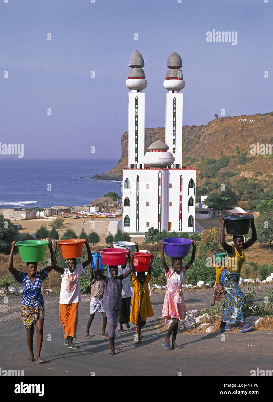 Africa, Senegal, Dakar, Ouakam, person, mosque, town, capital, mosque, building, structure, coast, sea, part of town, women, locals, Africans, cases, water, carry, head costs, faith, religion, Islam, Stock Photo