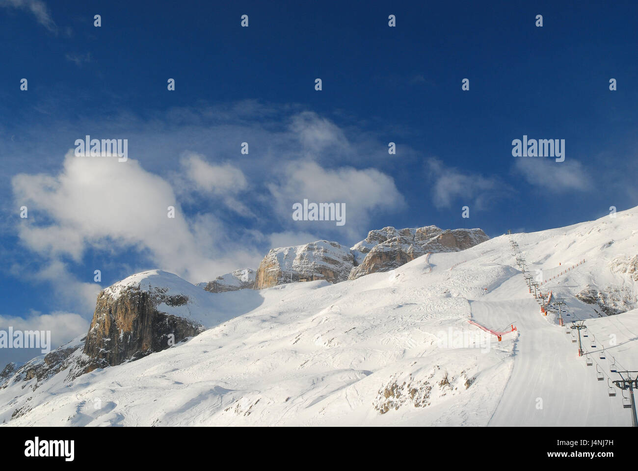 Italy, South Tirol, high abbey valley, Alta Badia, Corvara, ski region, runways, mountain landscape, mountains, the Dolomites, Sellagruppe, skiing area, lift attachment, armchair lift, lift, winter, snow-covered, winter vacation, ski vacation, skiing, alpine sport, winter sports, Stock Photo