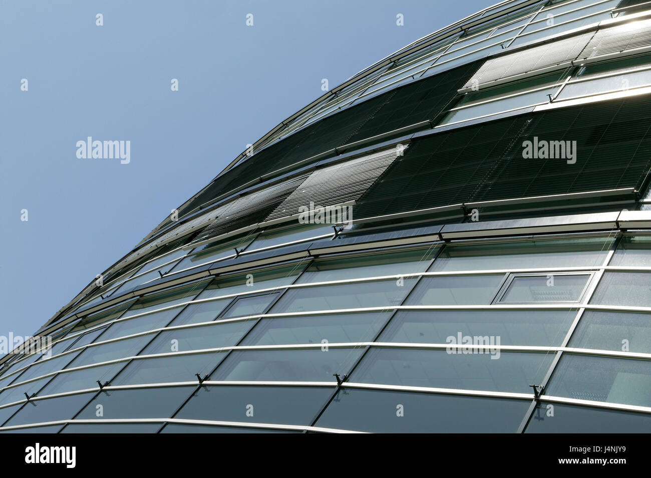 Germany, Bavaria, München-Riem, office building, glass front, from below, South Germany, Upper Bavaria, Munich, Riem, architecture, structure, building, outside, facade, glass, company building, office complex, new building, modern, natural light, sky, blue, Stock Photo