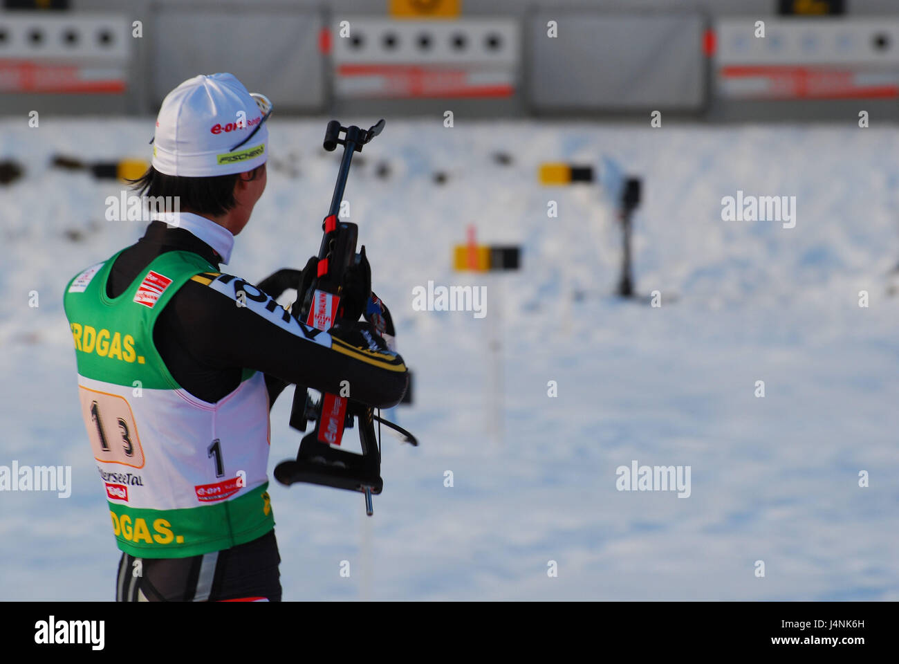 Austria, Tyrol, Pillerseetal, to high-level felts, biathlon, shooting range, Simone Hauswald, back view, DSV, shooting standing, sportswoman, biathlete, shoot, stand, there aim, biathlon, winter sports, ski event, event, people, event site, world cup race, skiing, serious sport, page portrait, Stock Photo