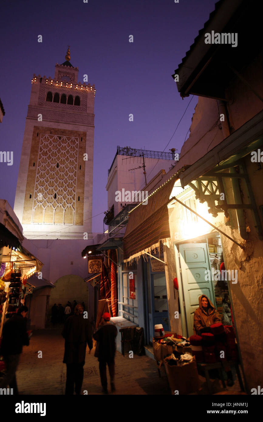 Tunisia, Tunis, Old Town, Souk, shops, Zitouna minaret, passer-by, evening, Stock Photo