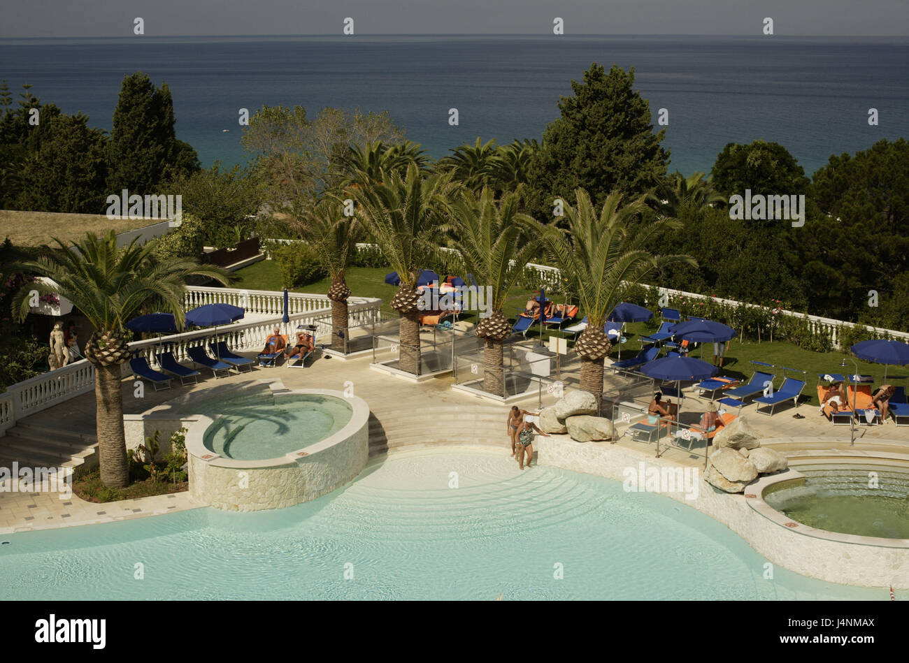 Italy, Calabria, Tropea, hotel Rocca Nettuno, pool attachment, tourist, Süditalien, hotel facility, pool, swimming pool, palms, deck chairs, people, détente, vacation, beach holiday, summer vacation, sea view, travel destination, tourism, hotel stay, Stock Photo