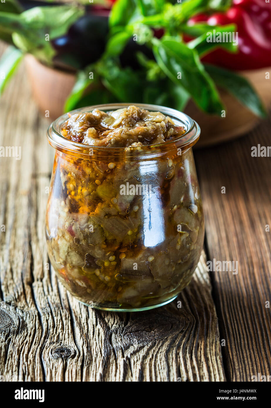 Eggplant preserve in glass jar on a rural table Stock Photo Alamy