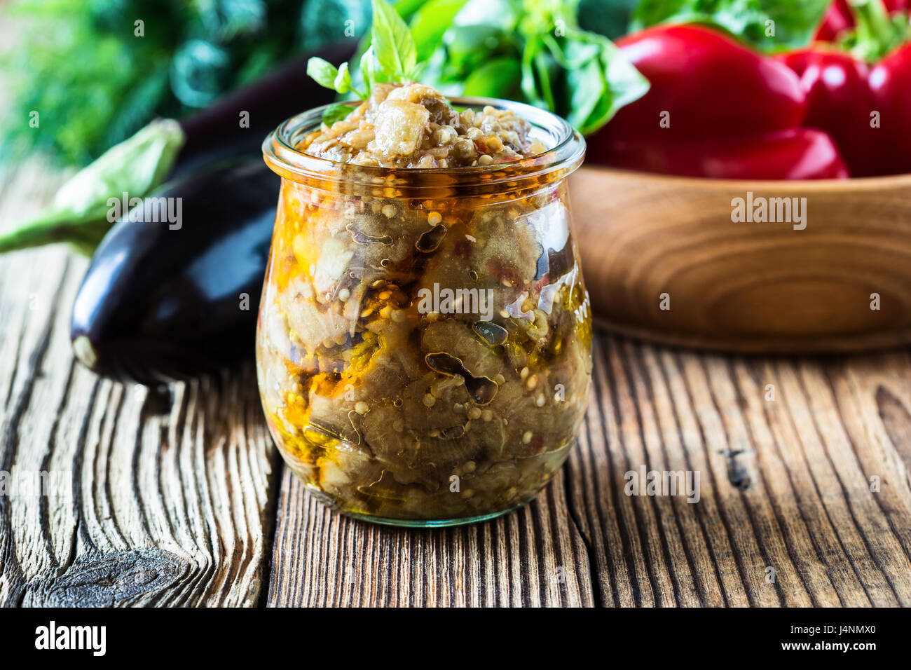 Eggplant preserve in glass jar on a rural table Stock Photo Alamy