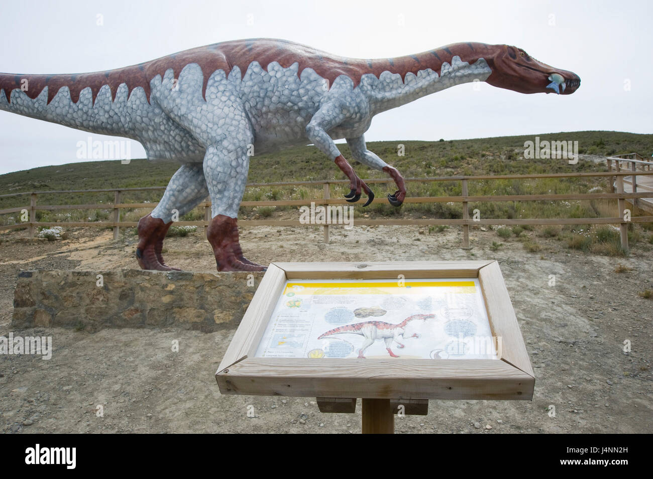 Life size replica of Baryonyx dinosaur eating fish. La Era del Peladillo site in IGEA village, La Rioja, Spain. theropod theropoda theropods Stock Photo