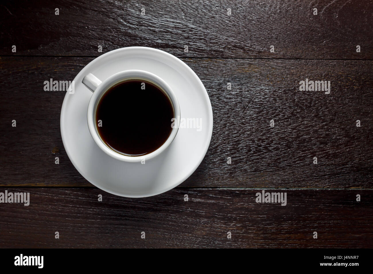 Top view black coffee on wood table with copy space Stock Photo - Alamy