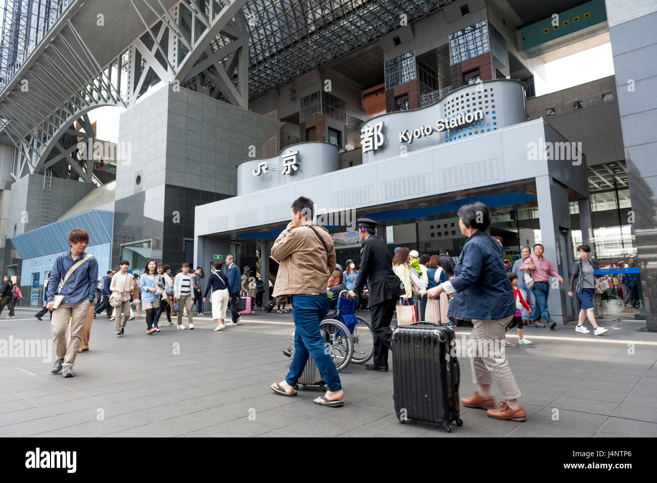 Crowd of people at the main entrance to Kyoto Station building, the